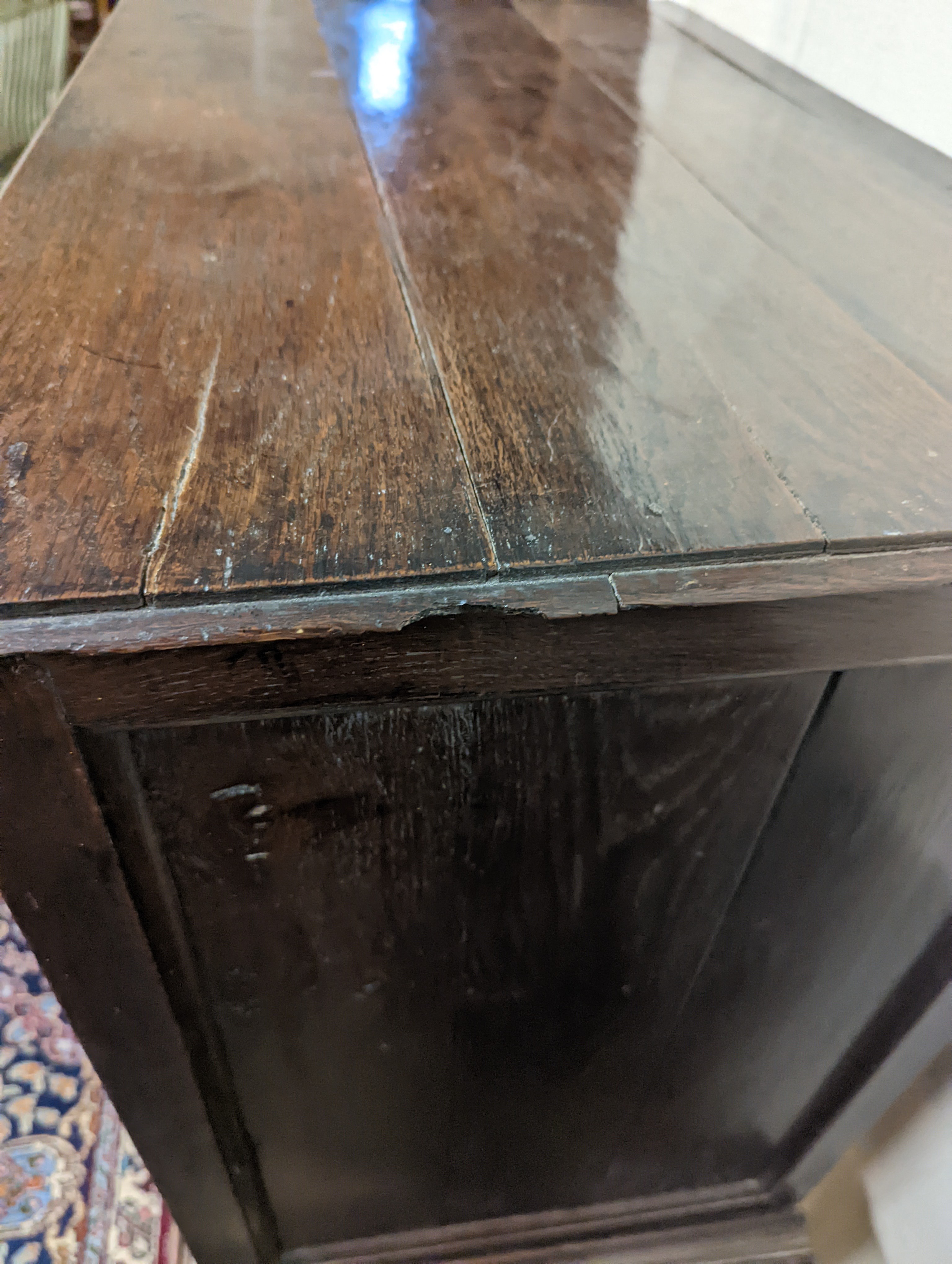 A mid 18th century oak chest on stand, width 89cm, depth 52cm, height 126cm